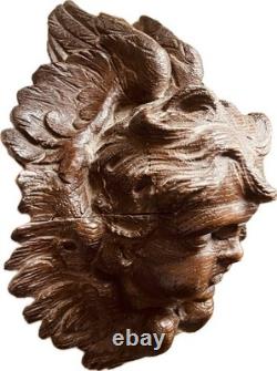 18th-century wooden sculpture of an old religious cherub angel
<br/> 	