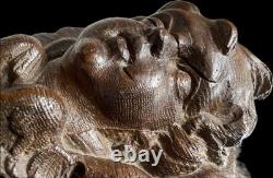 18th-century wooden sculpture of an old religious cherub angel <br/>