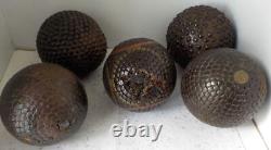 5 Lyonnaise cloutée pétanque balls, including 1 with No. 2 folk art