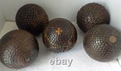 5 Lyonnaise cloutée pétanque balls, including 1 with No. 2 folk art