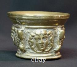 An old beautiful 19th-century mortar, 1.5 kg cut, gilded bronze medallion