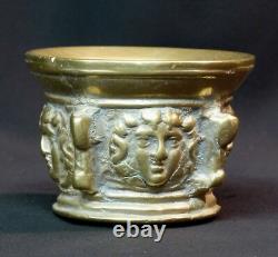 An old beautiful 19th-century mortar, 1.5 kg cut, gilded bronze medallion