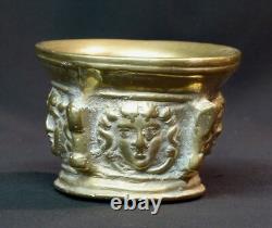 An old beautiful 19th-century mortar, 1.5 kg cut, gilded bronze medallion