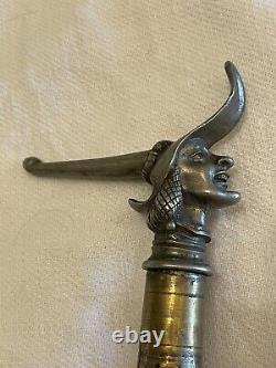 Ancient Cane with Man's Head