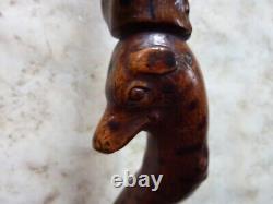 Ancient and Rare Cane Character and Dog Folk Art