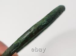 Ancient bronze bangle bracelet decorated with geometric motifs, Roman era