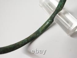 Ancient bronze bangle bracelet decorated with geometric motifs, Roman era