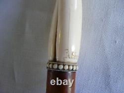 Ancient cane collection with twisted carved bone handle engraved by Huppy and Abbeville