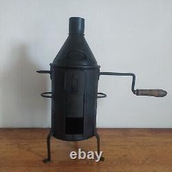 Ancient coffee roaster grill in tinware