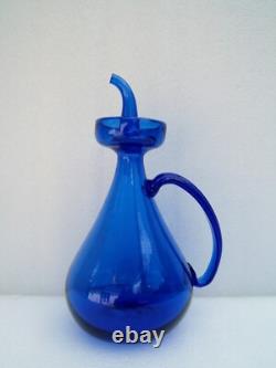 Ancient folk art cobalt blue blown glass oil bottle and oil cruet