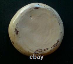 Ancient glazed dish. Zoomorphic ceramic.