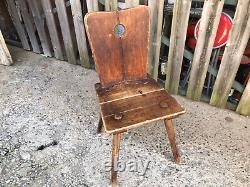 Ancient solid wood chair in popular Queyras or Savoie style mountain cottage decoration