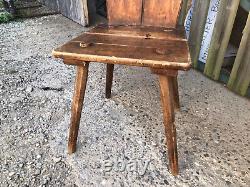 Ancient solid wood chair in popular Queyras or Savoie style mountain cottage decoration