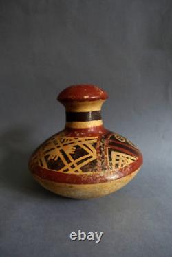 Ancient terracotta gourd with painted ethnic decoration, origin to be determined
