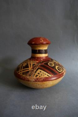 Ancient terracotta gourd with painted ethnic decoration, origin to be determined