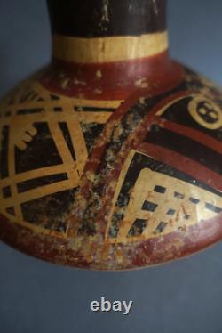 Ancient terracotta gourd with painted ethnic decoration, origin to be determined