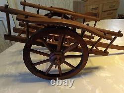 Ancient toy wooden cart and oxen harness from the company Dejou (1935-1985)