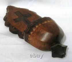 Ancient wooden monoxyle holy water font popular art cross