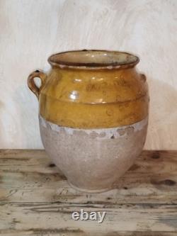 Ancient yellow glazed terracotta pot Southwest