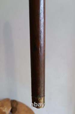 Antique Walking Stick with a Carved Ebony Handle
