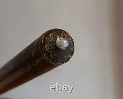Antique Walking Stick with a Carved Ebony Handle