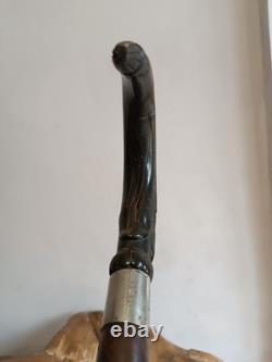 Antique Walking Stick with a Carved Ebony Handle