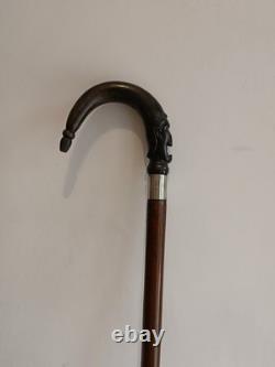 Antique Walking Stick with a Carved Ebony Handle