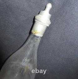Antique blown glass and cracked tin 19th century popular art feeding bottle