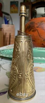 Antique brass priming powder flask with embossed decoration, 19th century