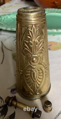 Antique brass priming powder flask with embossed decoration, 19th century