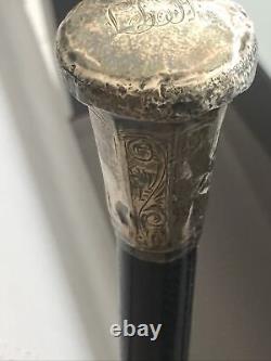 Antique cane with silver pommel and chiseled motifs, Milord cane from the 19th century.