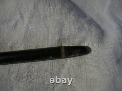 Antique collectible cane with system. A hole in the handle. Pencil holder