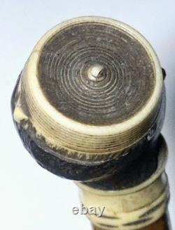 Antique dandy’s cane, late 19th century, ebony carved handle with a black man’s head pommel