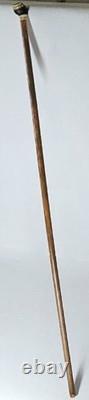 Antique dandy’s cane, late 19th century, ebony carved handle with a black man’s head pommel