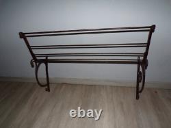 Antique early 20th-century wrought iron bakery bread display stand