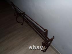 Antique early 20th-century wrought iron bakery bread display stand