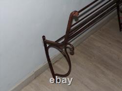 Antique early 20th-century wrought iron bakery bread display stand