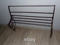 Antique early 20th-century wrought iron bakery bread display stand