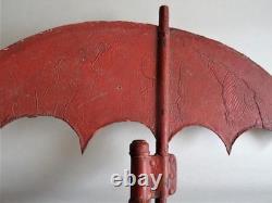 Antique street sign of an umbrella and parasol merchant