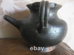 Antique terracotta baby bottle