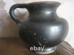 Antique terracotta baby bottle