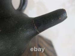 Antique terracotta baby bottle