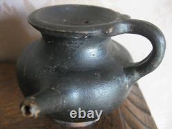 Antique terracotta baby bottle