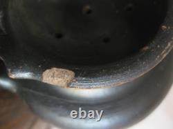 Antique terracotta baby bottle