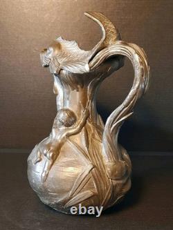 Art Nouveau pewter pitcher signed H. Huppé (1855–1904)