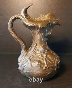 Art Nouveau pewter pitcher signed H. Huppé (1855–1904)