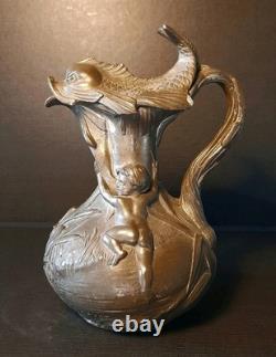 Art Nouveau pewter pitcher signed H. Huppé (1855–1904)