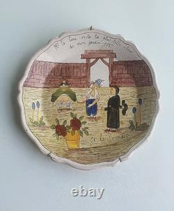 Beautiful Nevers plate with 18th-century scalloped edges featuring an artistic theme