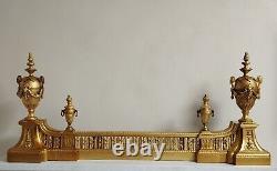 Beautifully crafted antique gilded bronze andirons bar, 19th century