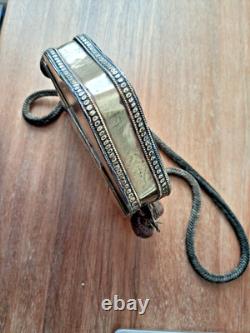 Brass and metal Quran stand, with bone plaque inlay and cord<br/>